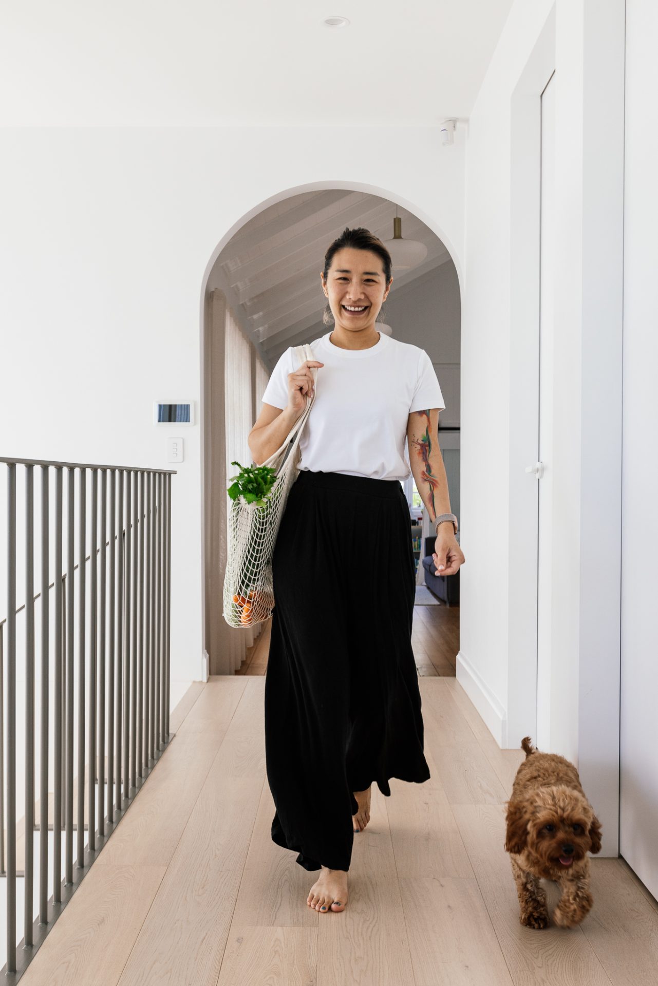 Family Clean Cleaners Person walking down hallway with dog